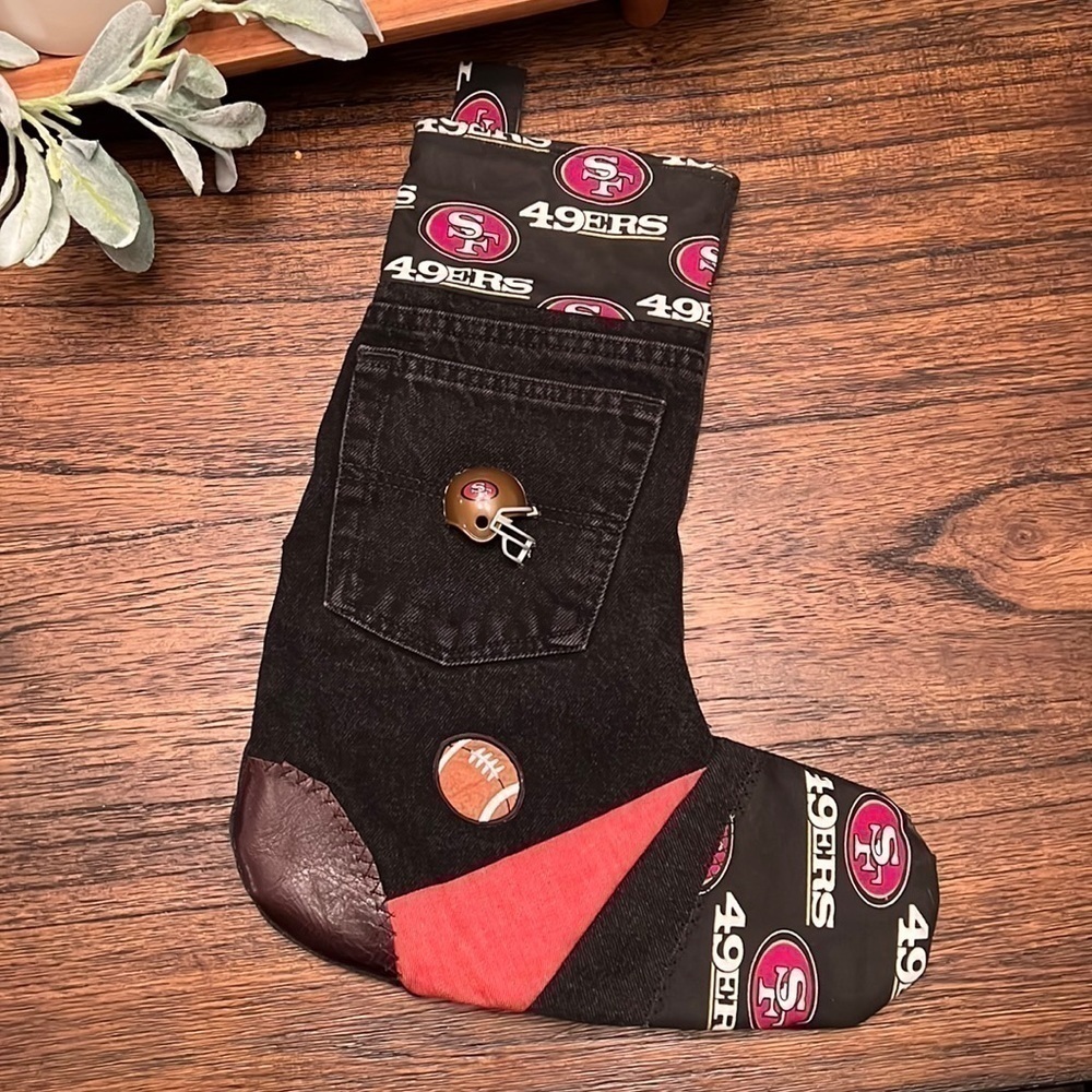 49rs Christmas stocking. 1OAK made from denim, leather and fabric.